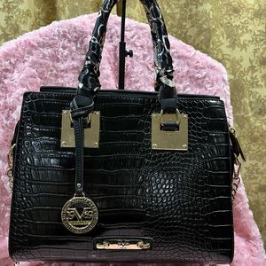 Vintage Authentic Versace handbag in good condition.